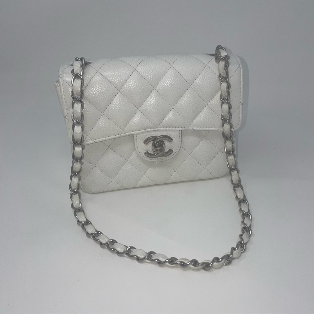 Sold Chanel Vintage White caviar mini square, silver hardware.